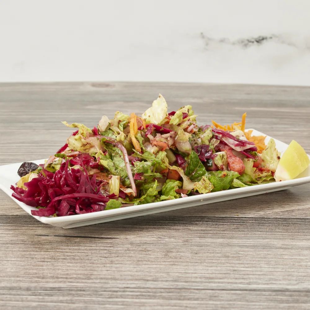 Garden salad with lettuce, tomato, cucumber, red cabbage and carrot
