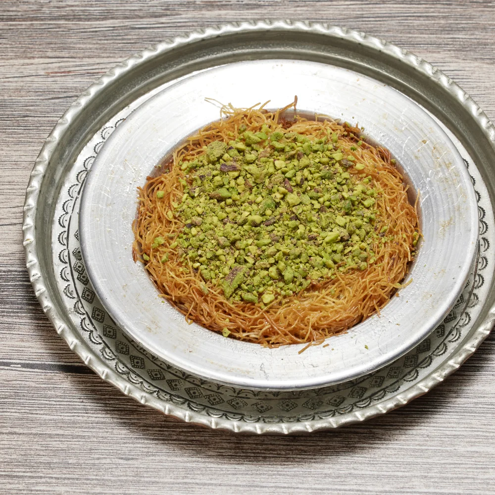 Künefe topped with crushed pistachios