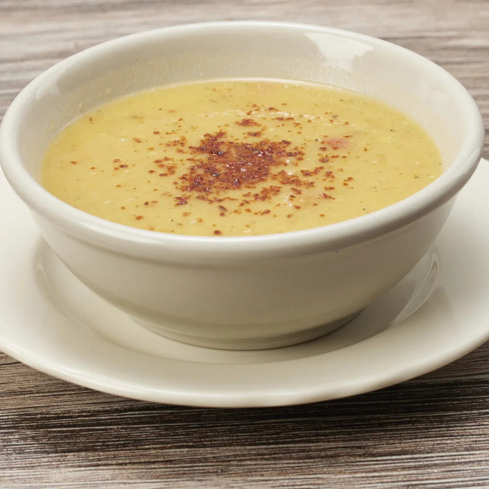 Red lentil soup topped with paprika
