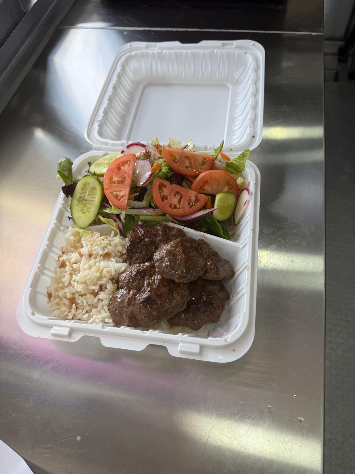 Turkish meatball plate with rice and salad